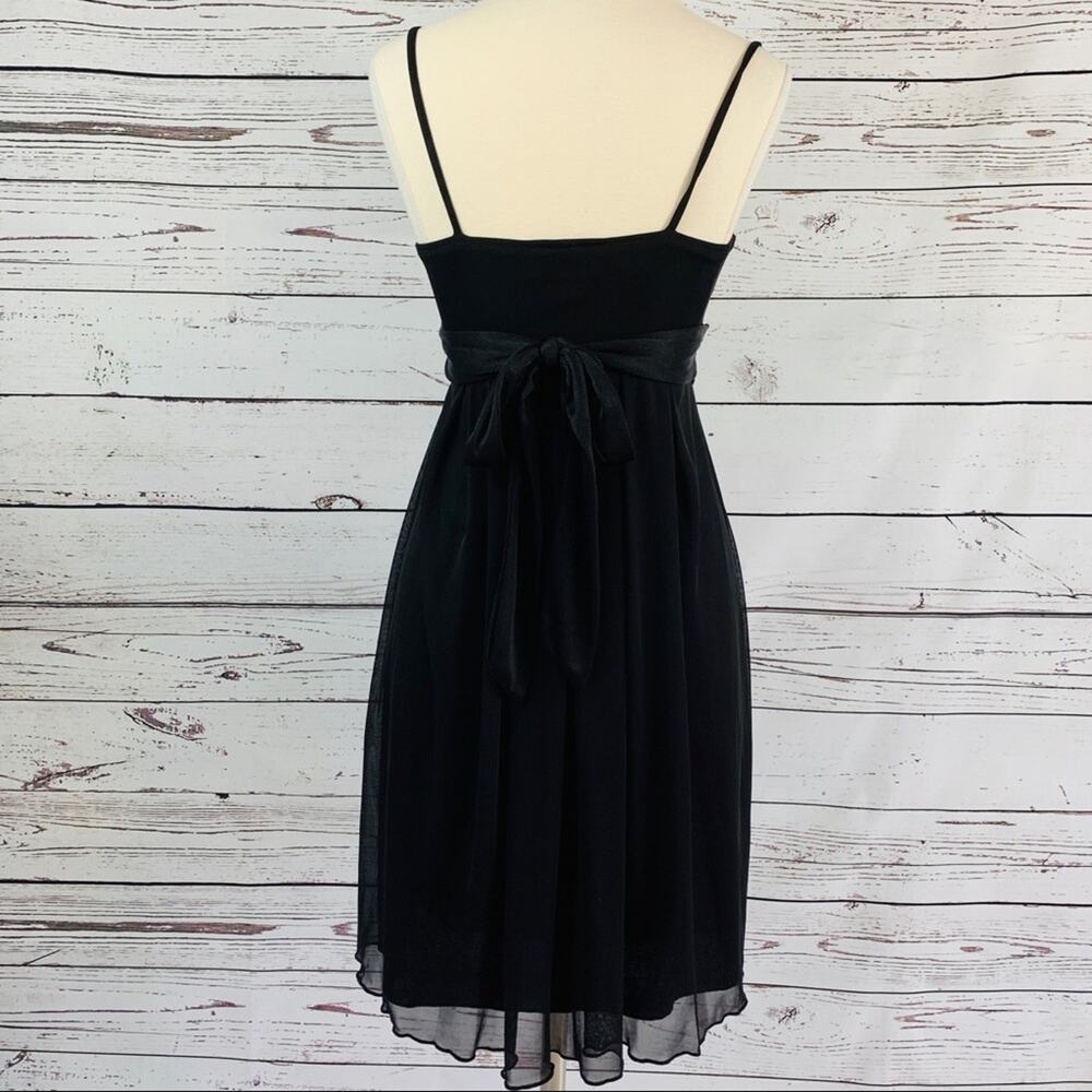 B. Wear Little Black Dress with straps - Picture 3 of 5